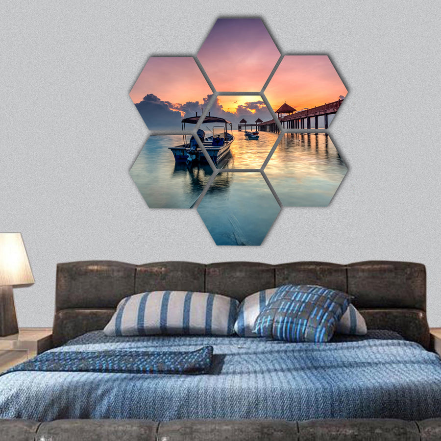 Golden sunrise with stone jetty hexagonal canvas wall art
