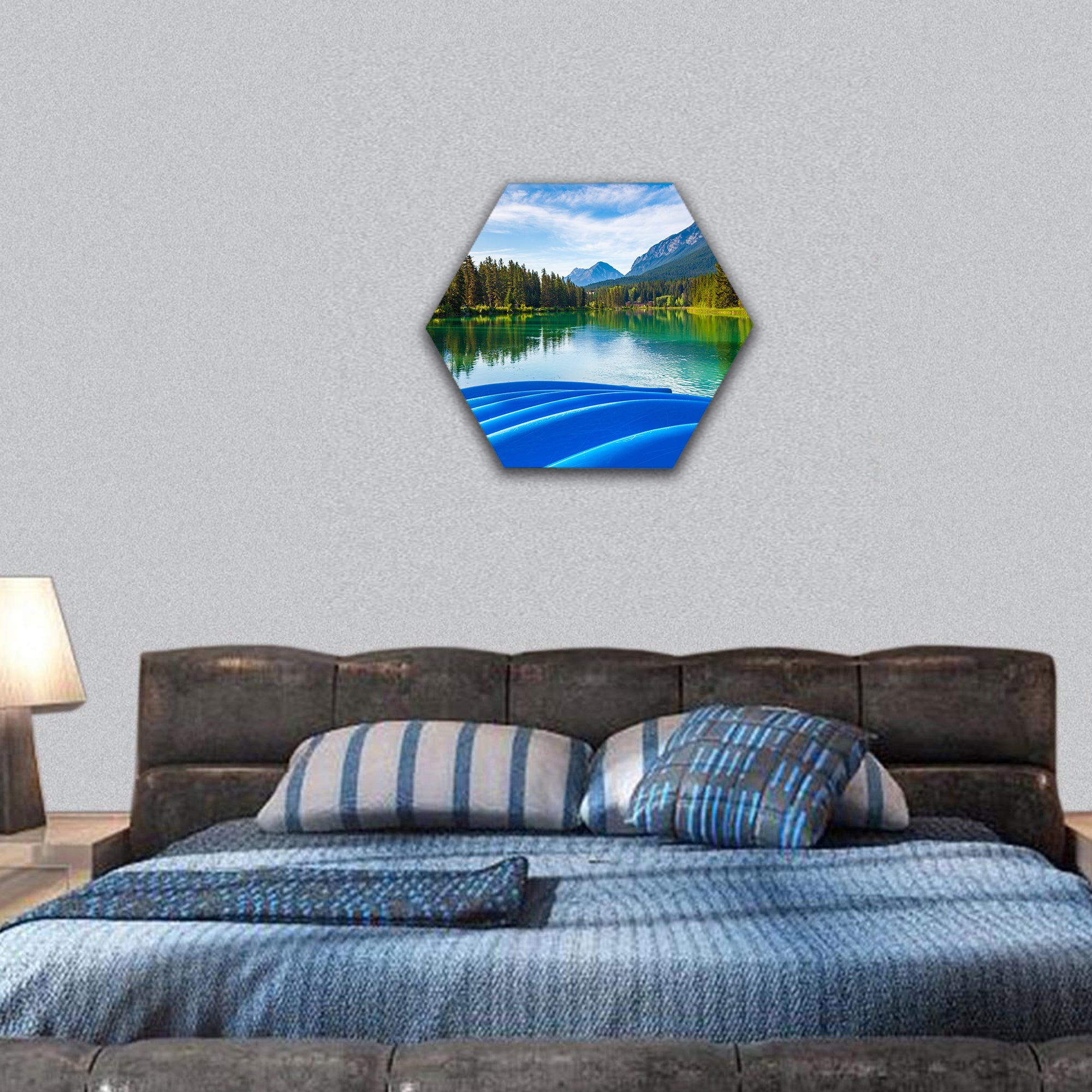 Blue canoes on the shore of the Bow River hexagonal canvas wall art