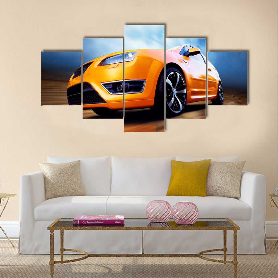 Beautiful orange sport car on road Multi panel canvas wall art