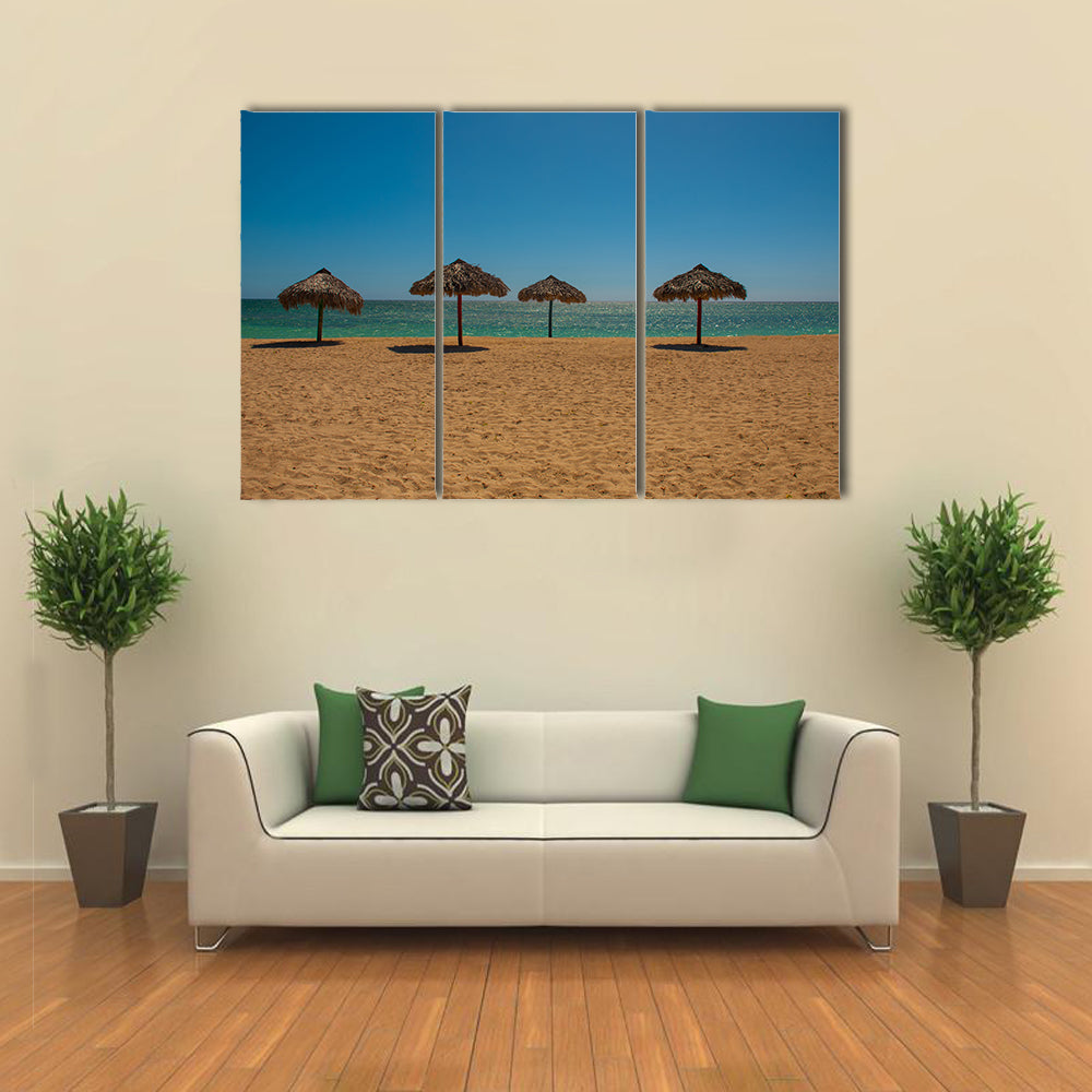 Umbrellas Cuba. Trinidad. Ancona Beach, Caribbean Sea on a tropical island Multi panel canvas wall art
