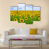 Fine summer field of sunflowers in the blue sky Multi panel canvas wall art