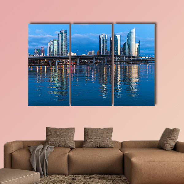 Marine City at night, panoramic skyline of luxury skyscrapers multi panel canvas wall art