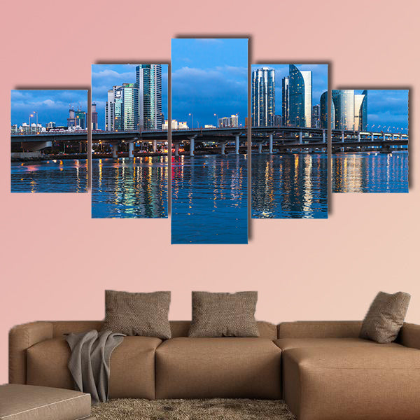 Marine City at night, panoramic skyline of luxury skyscrapers multi panel canvas wall art