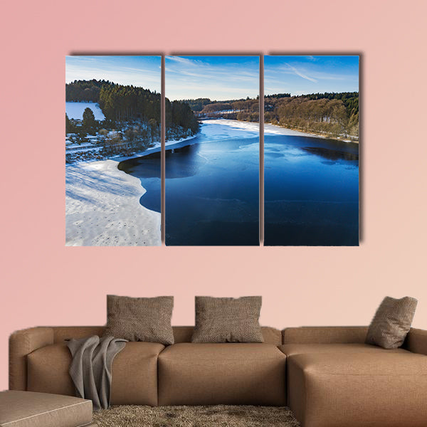 Aerial view of the partially frozen Lingese dam multi panel canvas wall art