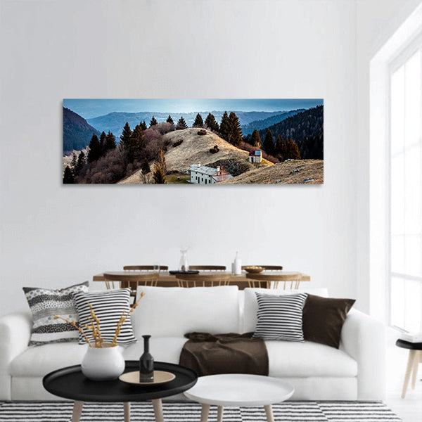 Sunrise on a small hut panoramic canvas wall art.