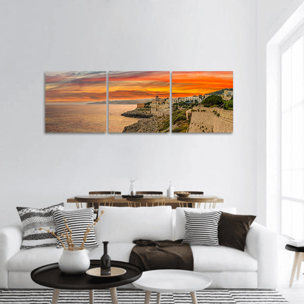 Sunset on town on the coast panoramic canvas wall art