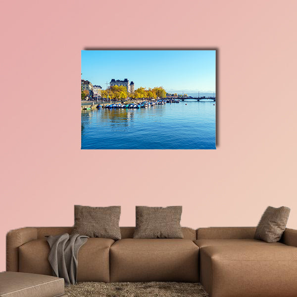Embankment of river Limmat with city tram in warm light, wall art
