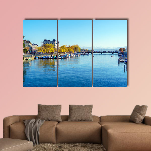 Embankment of river Limmat with city tram in warm light, wall art