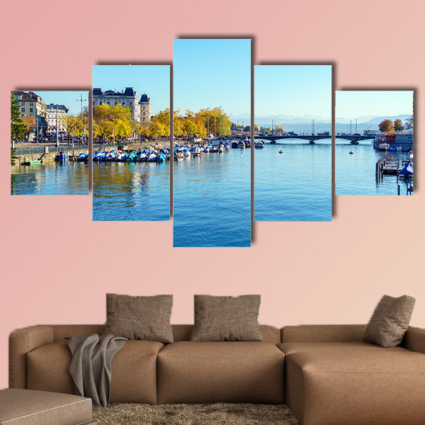 Embankment of river Limmat with city tram in warm light, wall art