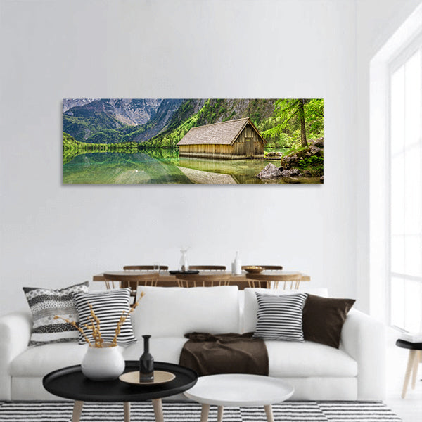 Small wooden cottage panoramic canvas wall art