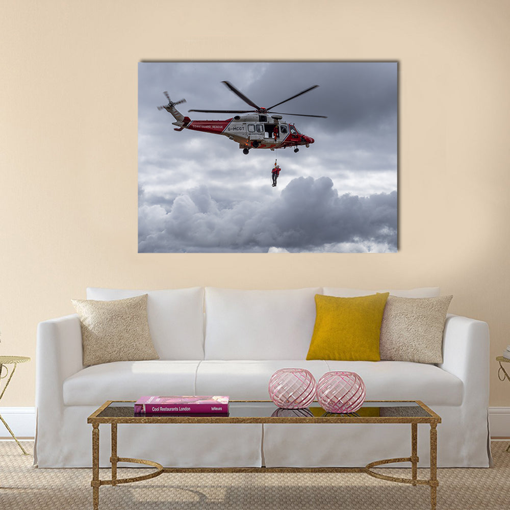 A coastguard helicopter dropping off mountain rescue team members multi panel canvas wall art
