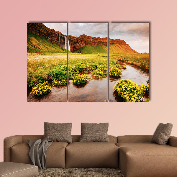 Lovely view of blooming green field in sunlight multi panel canvas wall art