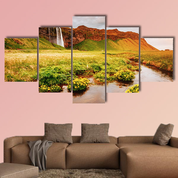 Lovely view of blooming green field in sunlight multi panel canvas wall art