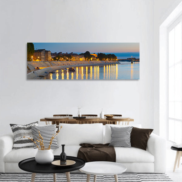 People walking at an embankment panoramic canvas wall art