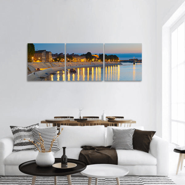 People walking at an embankment panoramic canvas wall art