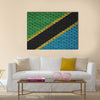 Tanzania flag is painted onto an old brick wall Multi Panel Canvas Wall Art