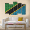 Tanzania flag is painted onto an old brick wall Multi Panel Canvas Wall Art