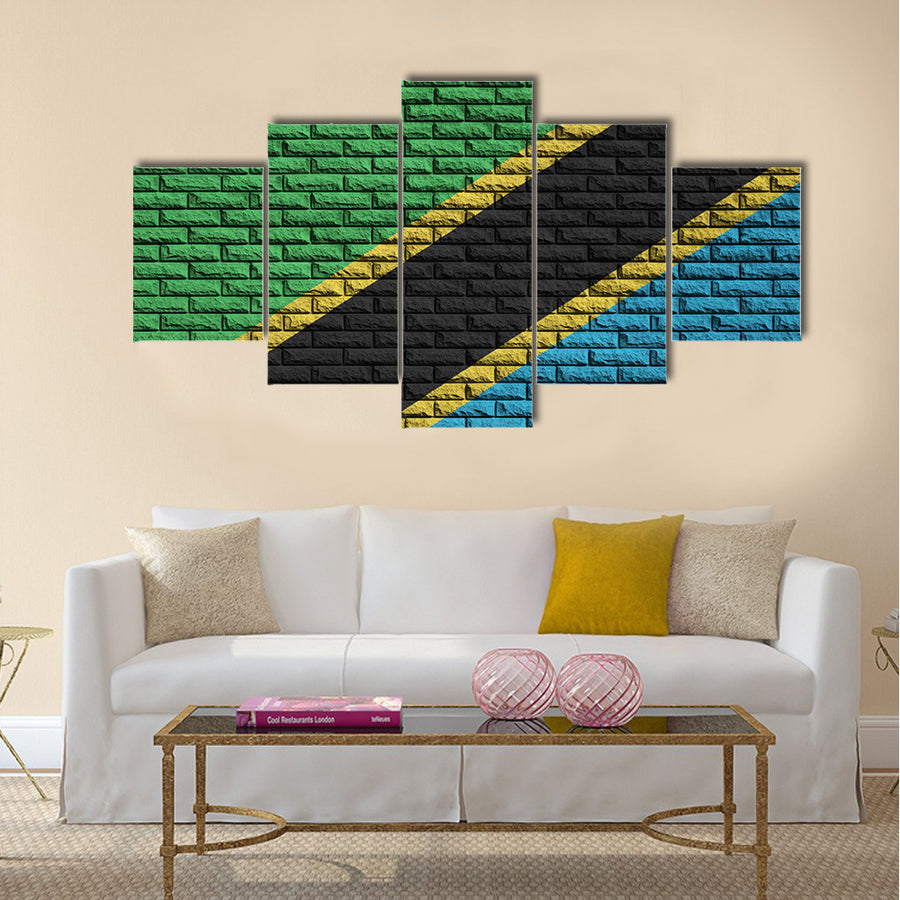 Tanzania flag is painted onto an old brick wall Multi Panel Canvas Wall Art