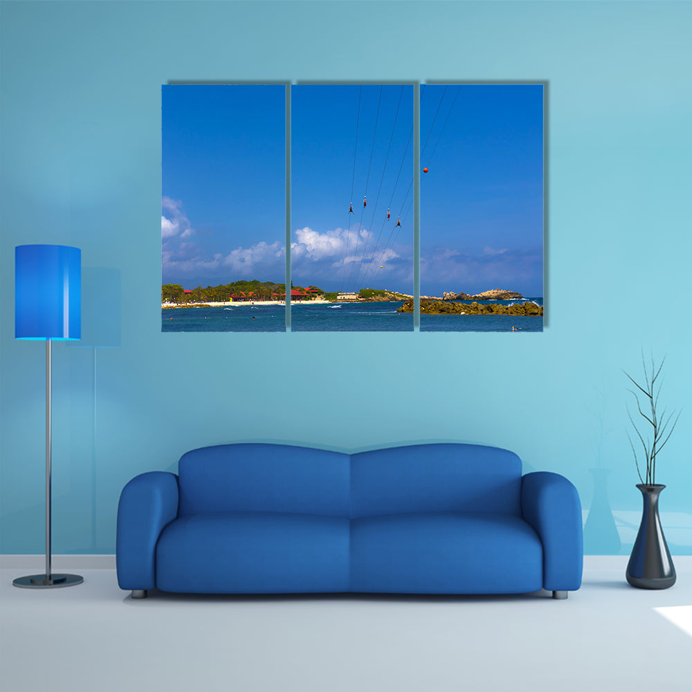 People flying at high zipline on Caribbean Multi panel canvas wall art