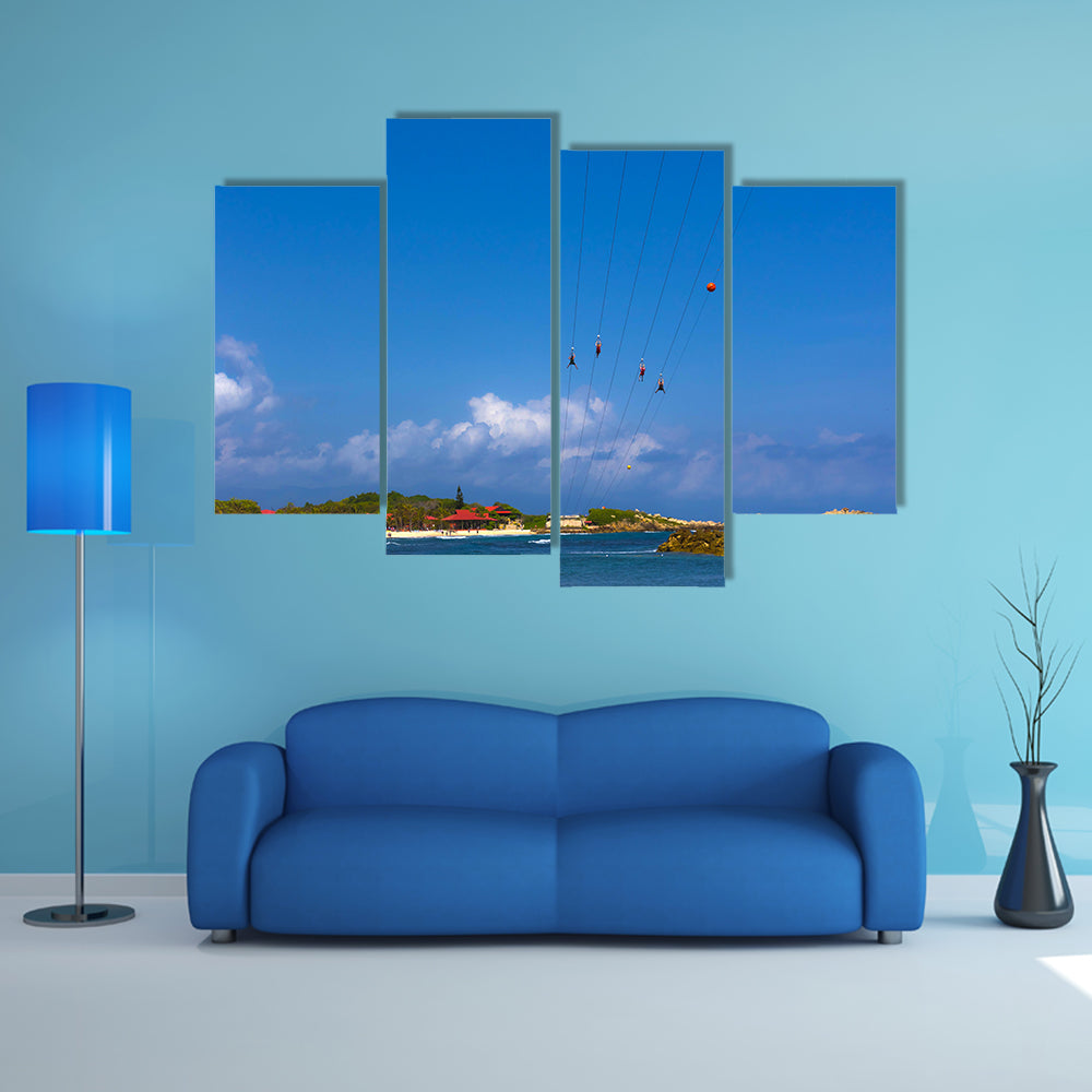 People flying at high zipline on Caribbean Multi panel canvas wall art