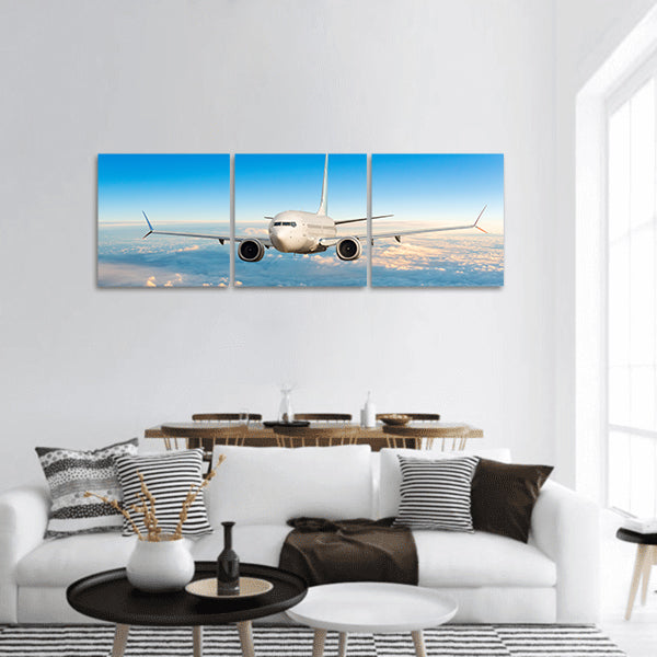 Front view of aircraft in flight panoramic canvas wall art