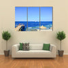 Visitors at snorkelling in the sea during the surf Multi panel canvas wall art