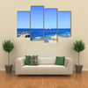 Visitors at snorkelling in the sea during the surf Multi panel canvas wall art