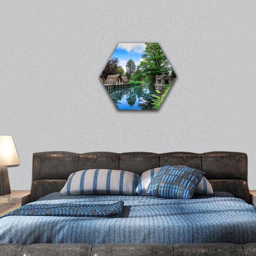 Old straw houses in bally park Switzerland hexagonal canvas wall art