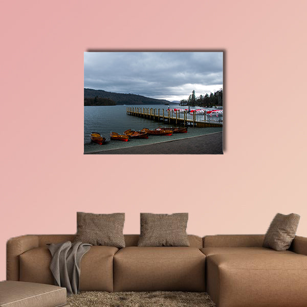 A row of wooden boats, next to a pier and speed boats, in canvas wall art
