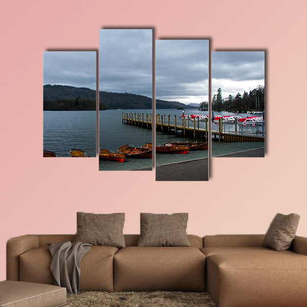 A row of wooden boats, next to a pier and speed boats, in canvas wall art