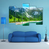 Beautiful summer Alpine mountain lake view and sunshine in sky multi panel canvas wall art