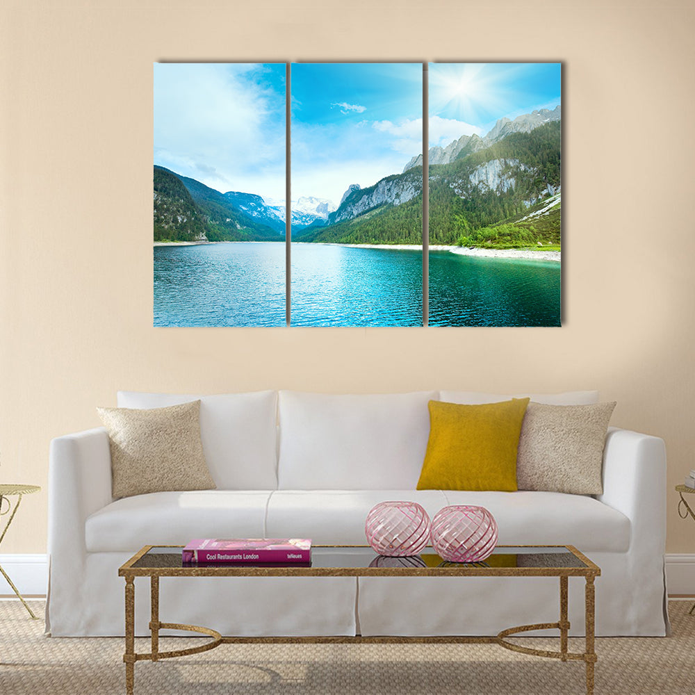 Beautiful summer Alpine lake Gosausee view and sunshine in sky multi panel canvas wall art