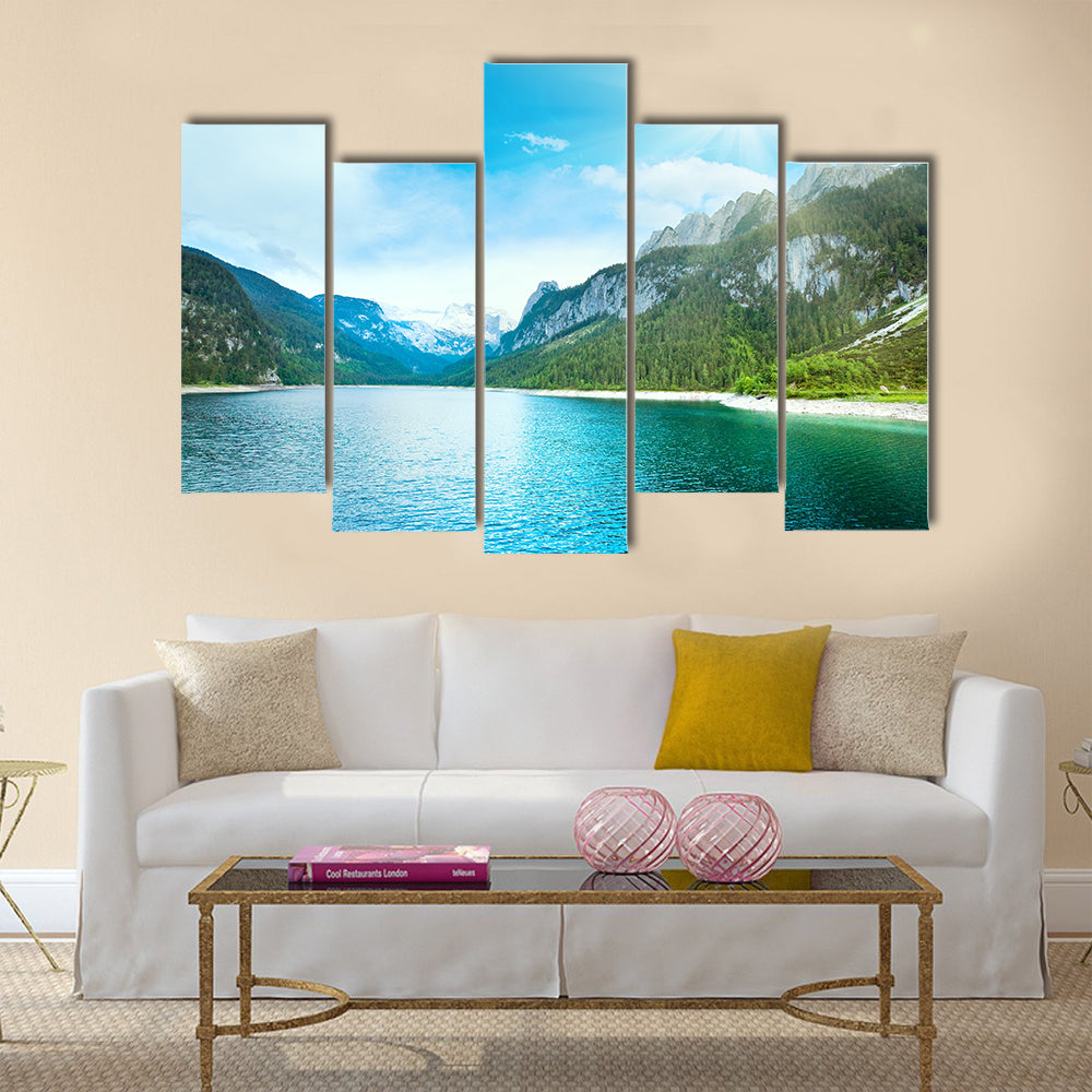Beautiful summer Alpine lake Gosausee view and sunshine in sky multi panel canvas wall art