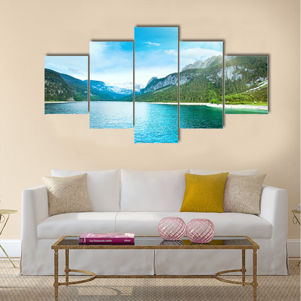 Beautiful summer Alpine lake Gosausee view and sunshine in sky multi panel canvas wall art