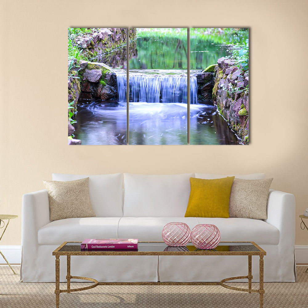 Small waterfall on a small picturesque brook in the forest Multi panel canvas wall art