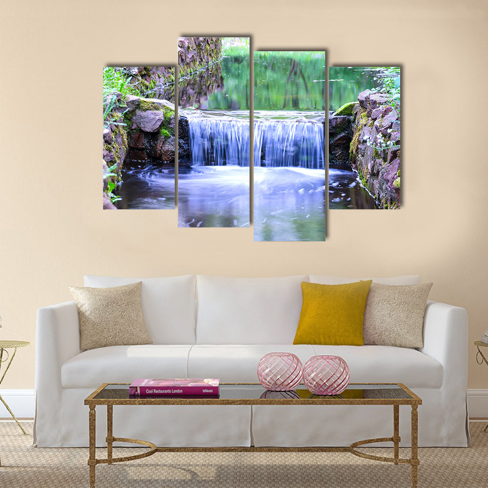 Small waterfall on a small picturesque brook in the forest Multi panel canvas wall art