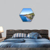 Atlantic coast with cliffs and Carrick-a-Rede National Trust hexagonal canvas wall art