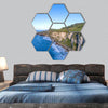 Atlantic coast with cliffs and Carrick-a-Rede National Trust hexagonal canvas wall art