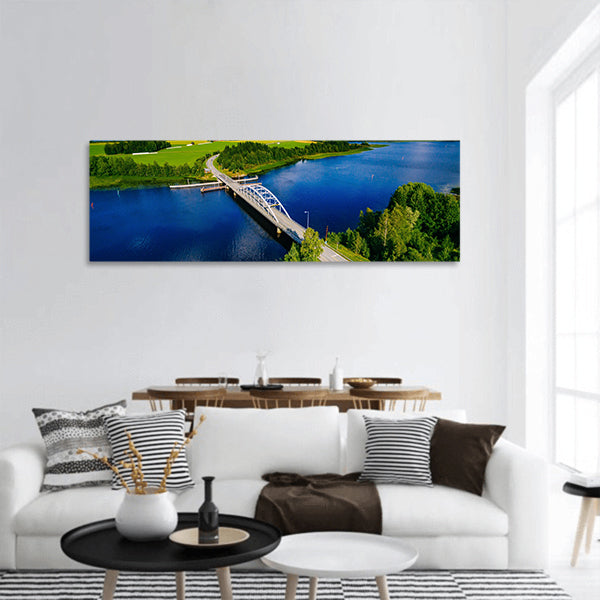 Aerial view on bridge over blue lake panoramic canvas wall art