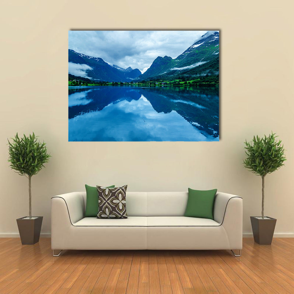 Lake in Norwegian fjords with reflection cloudy Multi panel canvas wall art