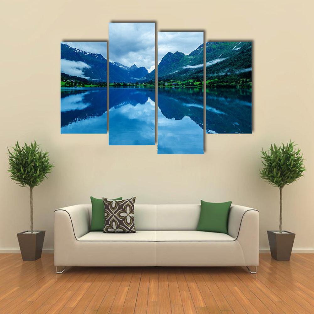 Lake in Norwegian fjords with reflection cloudy Multi panel canvas wall art