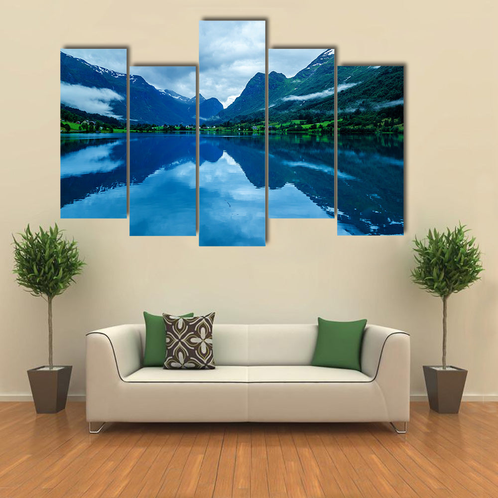 Lake in Norwegian fjords with reflection cloudy Multi panel canvas wall art