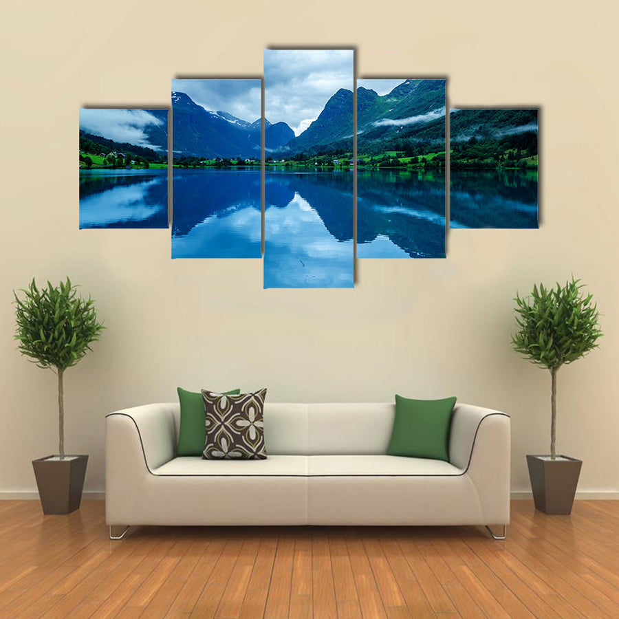 Lake in Norwegian fjords with reflection cloudy Multi panel canvas wall art