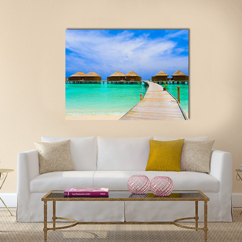 Water bungalows at a tropical island - travel background multi panel canvas wall art