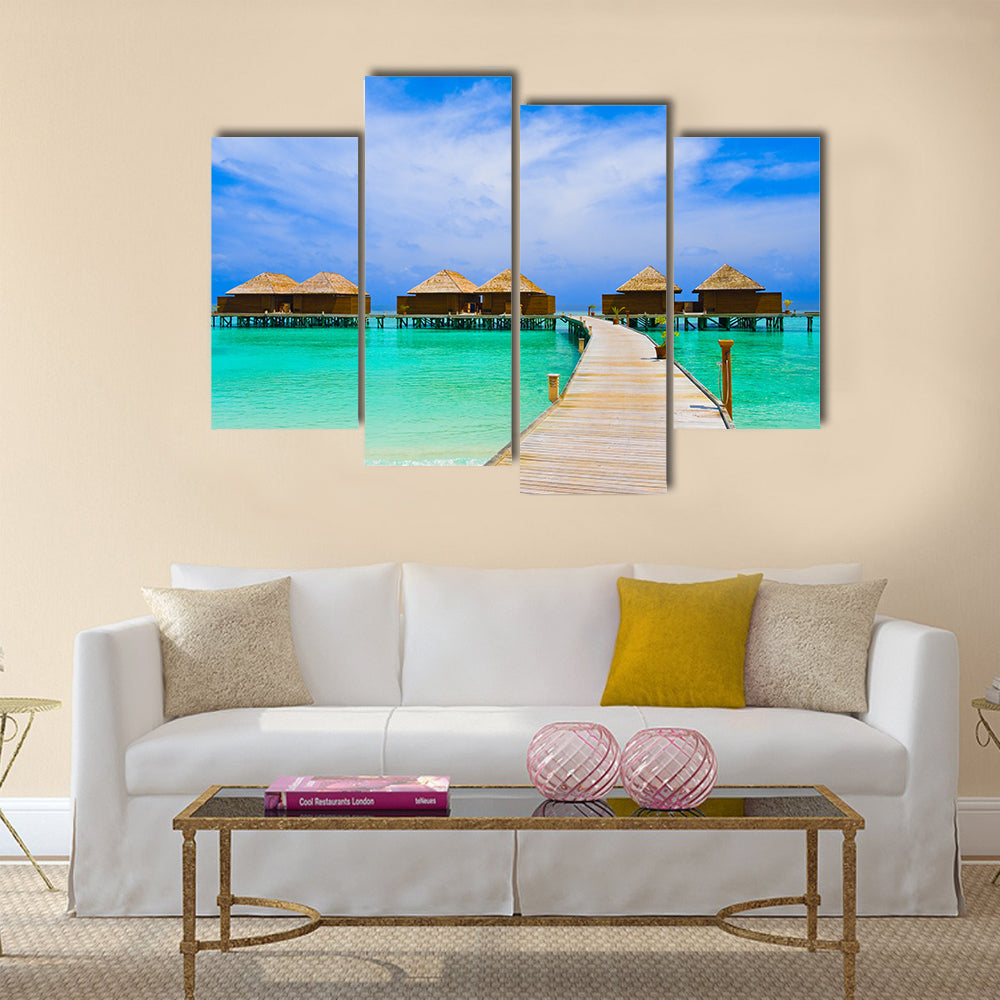 Water bungalows at a tropical island - travel background multi panel canvas wall art