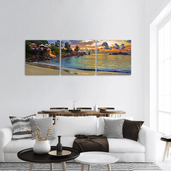 Cafe on tropical beach at sunset - nature background panoramic canvas wall art