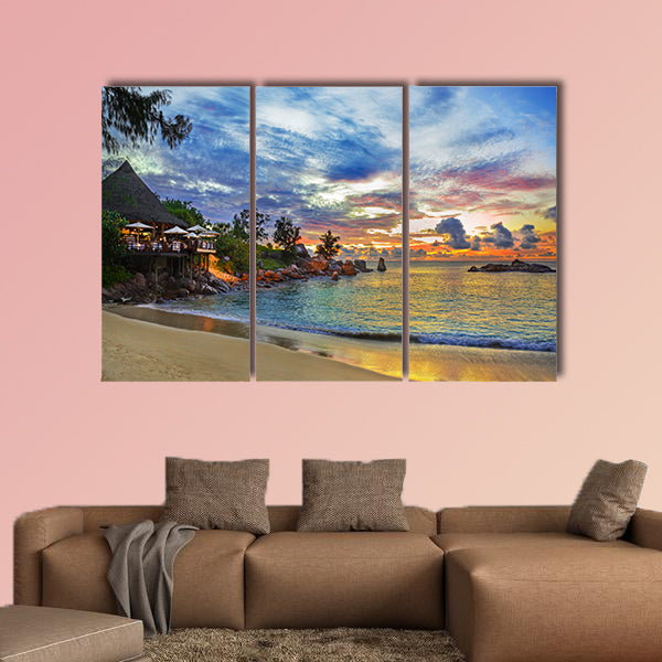 Cafe on tropical beach at sunset multi panel canvas wall art