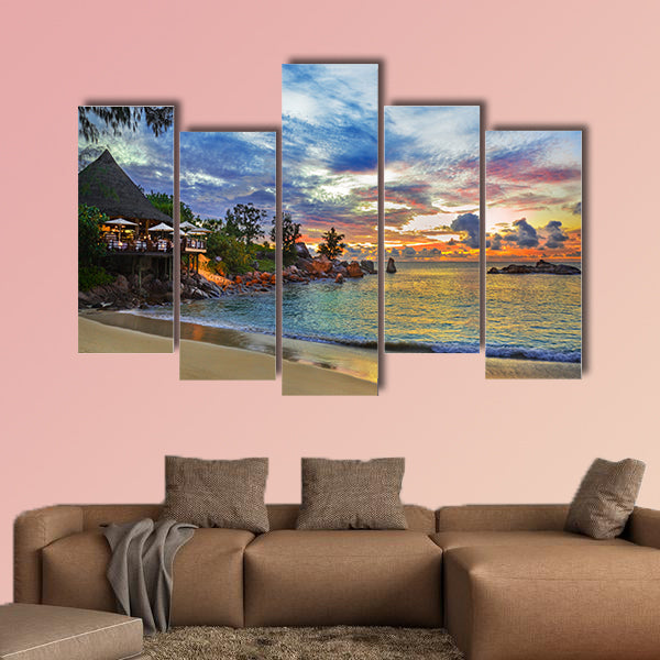Cafe on tropical beach at sunset multi panel canvas wall art