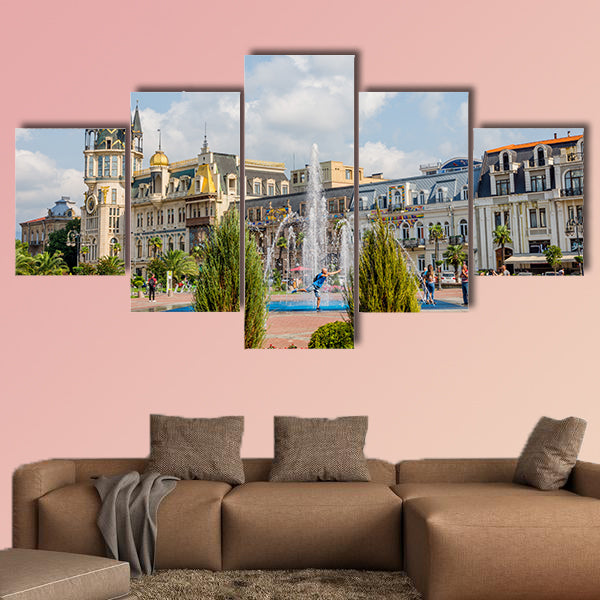 People enjoying the water fountain at Europe Park multi panel canvas wall art