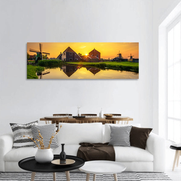 Sunset above farm houses panoramic canvas wall art